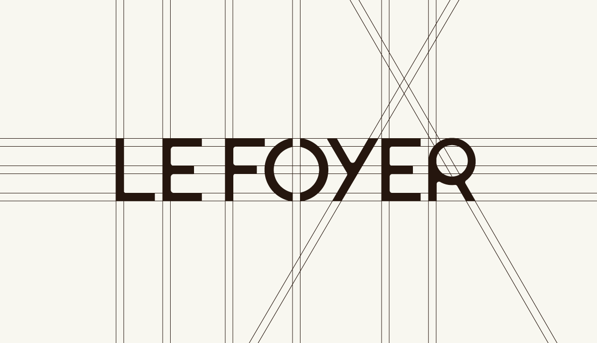 logo du foyer avec la grille de construction